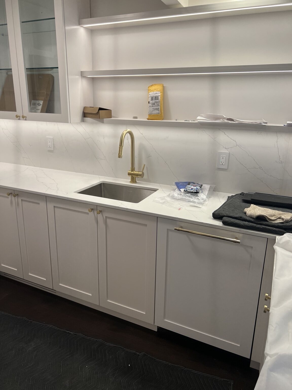 Finished kitchen sink and gold faucet installation
